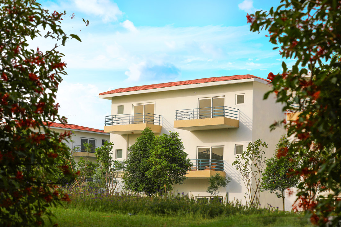 Paramount Golf Foreste gated community with villas and open landscape in Greater Noida