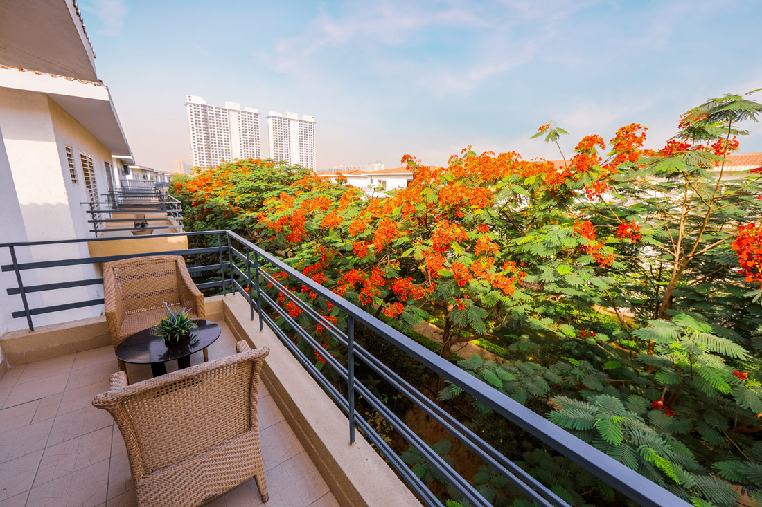 Balcony overlooking Paramount Golf Foreste green areas in Greater Noida